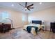 Inviting bedroom with area rug, two windows, and a writing desk at 654 Jungle Queen Way, Longboat Key, FL 34228