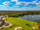 Breathtaking aerial view of golf course, lake and homes in beautiful community at 6914 Grand Estuary Trl # 101, Bradenton, FL 34212