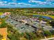 Extensive tennis court complex with manicured landscaping and community amenities at 6914 Grand Estuary Trl # 101, Bradenton, FL 34212