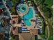 Stunning aerial view of a uniquely shaped pool, offering a luxurious escape at 6914 Grand Estuary Trl # 101, Bradenton, FL 34212
