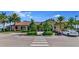Well-maintained community building with manicured landscaping and convenient parking at 6914 Grand Estuary Trl # 101, Bradenton, FL 34212