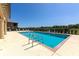 Beautiful community pool with crystal-clear water, ample seating, and well-maintained surroundings, ideal for leisure and enjoyment at 6914 Grand Estuary Trl # 101, Bradenton, FL 34212
