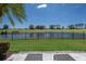 Seating on the patio looking onto the pond and golf course at 7218 Teal Creek Gln, Lakewood Ranch, FL 34202