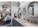 Bathroom featuring double sinks with granite countertops at 7218 Teal Creek Gln, Lakewood Ranch, FL 34202