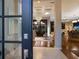 Elegant entryway with marble flooring, chandelier lighting, and views of the living spaces at 7218 Teal Creek Gln, Lakewood Ranch, FL 34202
