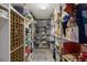Well-organized walk-in pantry with extensive shelving, perfect for storage and convenience, with room for a wine rack at 7218 Teal Creek Gln, Lakewood Ranch, FL 34202