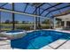 Enclosed swimming pool and spa overlooking golf course at 7128 Teal Creek Gln, Lakewood Ranch, FL 34202