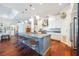 Kitchen with a large island, stainless steel appliances, and open layout at 7231 Brambury Ct, Sarasota, FL 34238