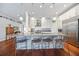 Modern kitchen with a large island, stainless steel appliances, and open layout at 7231 Brambury Ct, Sarasota, FL 34238