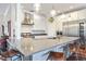 Modern kitchen with a large island, stainless steel appliances, and open layout at 7231 Brambury Ct, Sarasota, FL 34238