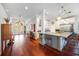Modern kitchen featuring a large island, stainless steel appliances, and an open layout at 7231 Brambury Ct, Sarasota, FL 34238