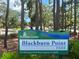 Blackburn Point Park sign with lush greenery, indicating local recreational opportunities at 7231 Brambury Ct, Sarasota, FL 34238
