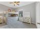 bedroom features a bunk bed, large window and a neutral color palette at 7418 61St E St, Palmetto, FL 34221