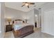 Neutral bedroom features a ceiling fan and natural light, creating a relaxing atmosphere at 7418 61St E St, Palmetto, FL 34221