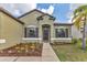 Charming single-story home with well-maintained landscaping and neutral exterior at 7418 61St E St, Palmetto, FL 34221