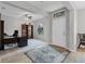 Bright home office with a ceiling fan, a desk, and a built-in bookshelf at 7418 61St E St, Palmetto, FL 34221