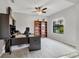 Bright home office featuring a built-in desk, shelving, and large window with a view at 7418 61St E St, Palmetto, FL 34221