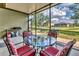 Cozy screened patio with comfortable seating, perfect for enjoying the outdoors year-round at 7418 61St E St, Palmetto, FL 34221