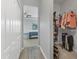 This walk-in closet provides ample storage with well-organized shelving and clothing racks at 7418 61St E St, Palmetto, FL 34221