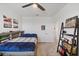 Bedroom features a cozy bed, stylish decor, and a fun ladder shelf, perfect for a room at 7743 Nightfall Ter, Sarasota, FL 34241