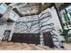 Community center rock climbing wall with safety mats and modern decor at 7743 Nightfall Ter, Sarasota, FL 34241