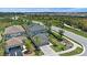 Beautiful two-story home featuring manicured landscaping and an attached two-car garage at 7743 Nightfall Ter, Sarasota, FL 34241