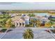A stunning aerial shot of the community clubhouse featuring well-manicured lawns and beautiful architectural details at 8195 Redonda Loop, Lakewood Ranch, FL 34202