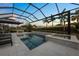 This pool boasts a spa, waterfall, and screened-in lanai, perfect for enjoying warm evenings at 8195 Redonda Loop, Lakewood Ranch, FL 34202