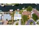 An aerial view shows the waterfront property with canal access and a pool at 10108 Kingfisher E Rd, Bradenton, FL 34209