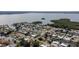 Waterfront neighborhood with canal access shows close proximity to bay and neighboring houses at 10108 Kingfisher E Rd, Bradenton, FL 34209