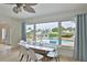 Bright dining room with a view of the outdoor pool at 10108 Kingfisher E Rd, Bradenton, FL 34209