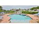 Beautiful backyard pool area featuring a spa and comfortable seating at 10108 Kingfisher E Rd, Bradenton, FL 34209