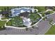 Aerial view of community amenities: a large pool, recreation area, and ample parking at 10725 Hidden Banks Gln, Parrish, FL 34219