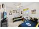The bedroom features two twin beds, a ceiling fan, and neutral walls at 10819 Wicker Park Pl, Palmetto, FL 34221