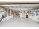 Spacious and organized garage with epoxy floor and plenty of wall decor at 10819 Wicker Park Pl, Palmetto, FL 34221