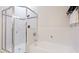 Bright bathroom features a glass shower, soaking tub and tile flooring at 11116 Sanctuary Dr, Bradenton, FL 34209