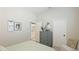 Bright bedroom features a stylish gray dresser, decorative accents and neutral paint at 11116 Sanctuary Dr, Bradenton, FL 34209