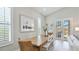 Charming dining area featuring a rustic wood table and an abundance of natural light at 11116 Sanctuary Dr, Bradenton, FL 34209