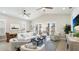 Bright living room with vaulted ceilings, comfortable seating, and a cozy atmosphere at 11116 Sanctuary Dr, Bradenton, FL 34209