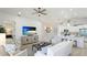 Open-concept living space with a shiplap accent wall and modern decor at 11116 Sanctuary Dr, Bradenton, FL 34209
