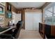Comfortable bedroom with a work area, closet and natural light from the window at 11592 57Th Street E Cir, Parrish, FL 34219