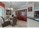 Breakfast nook with adjacent hutch and a bar leading into the kitchen at 11592 57Th Street E Cir, Parrish, FL 34219