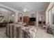 Bright living room featuring tile flooring, neutral paint, and access to the outdoor living space at 11592 57Th Street E Cir, Parrish, FL 34219