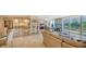 Bright and open living space with views of the balcony and access to a modern kitchen at 1212 Benjamin Franklin Dr # 503, Sarasota, FL 34236
