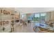 Comfortable living room area with large windows offering scenic views of the coastline at 1212 Benjamin Franklin Dr # 503, Sarasota, FL 34236