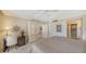 Well-appointed main bedroom with a desk, wardrobe, and ensuite bathroom entrance at 1212 Benjamin Franklin Dr # 503, Sarasota, FL 34236