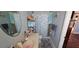 Bathroom with single sink, vanity and shower/tub combo with nautical decor at 1218 Carmella Ln, Sarasota, FL 34243