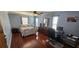 Spacious main bedroom boasts hard wood floors, plenty of natural light and neutral paint at 1218 Carmella Ln, Sarasota, FL 34243