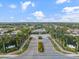 Panoramic aerial of Indigo community with tree-lined streets, lakes, and beautifully landscaped homes at 12706 Cobalt Ter, Bradenton, FL 34211