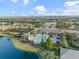 Community pool and recreational areas with lake and manicured landscaping at 12706 Cobalt Ter, Bradenton, FL 34211